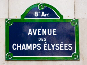 Plaque showing Paris Arrondissement Number and Name