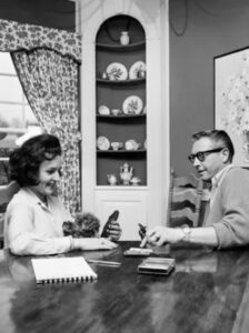 Betty White and Allen Ludden playing gin rummy.